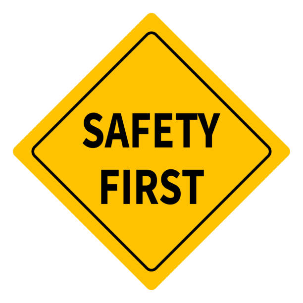 Yellow safety first sign.  Style sign isolated on white background. Vector illustration.